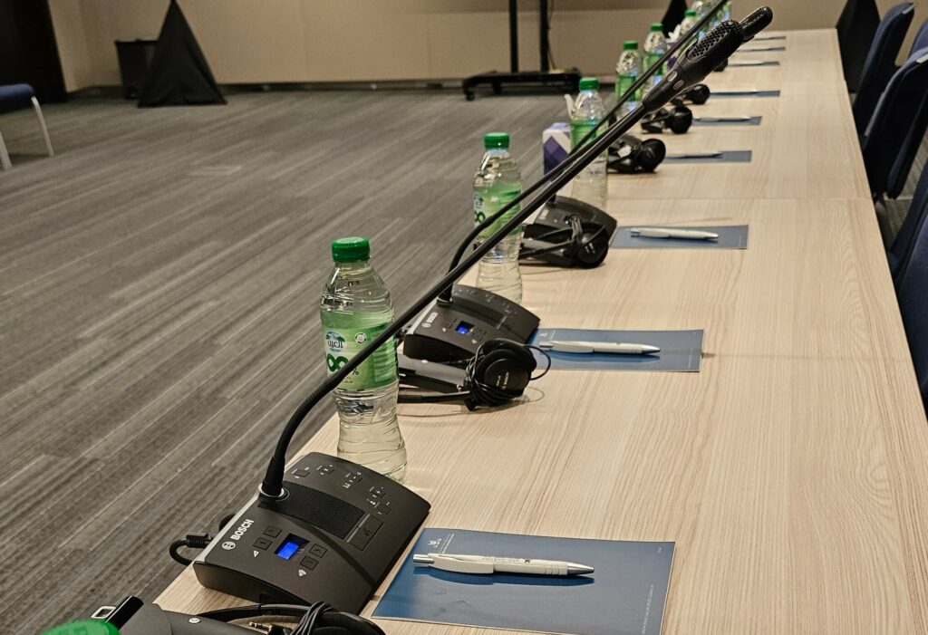 One Button, Zero Chaos: How Push-to-Talk Mics Transform Conferences 1 One Button Zero Chaos How Push to Talk Mics Transform Conferences